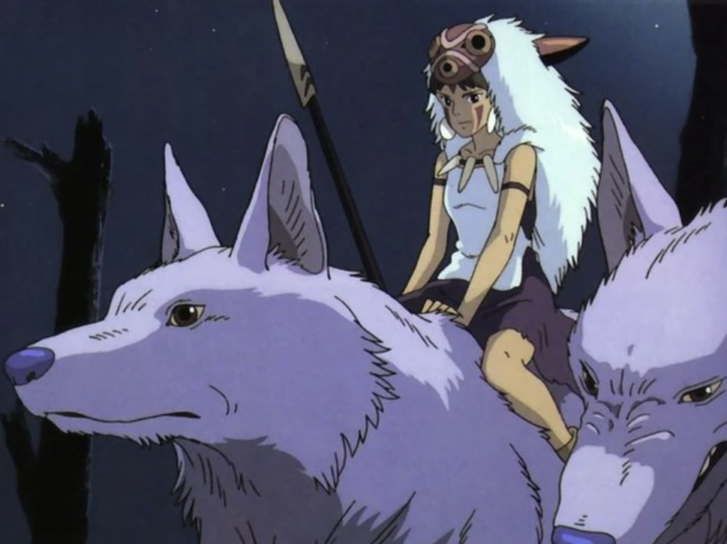 Screen shot still from the Princess Mononoke movie featuring San riding atop one of the two white wolves in the shot.