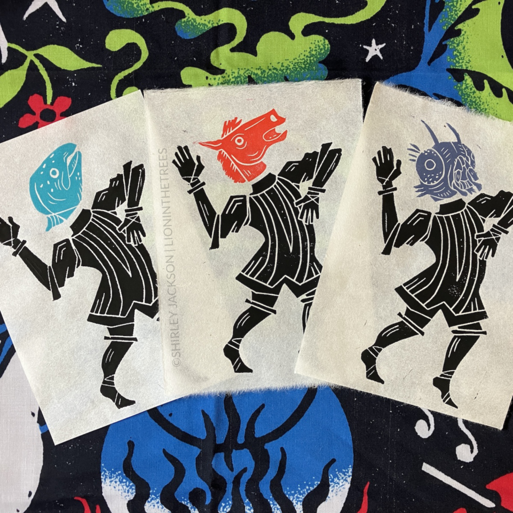 Group picture featuring all three prints spread in a fan-like formation. All three prints feature the same body printed, but the three have different coloured heads.