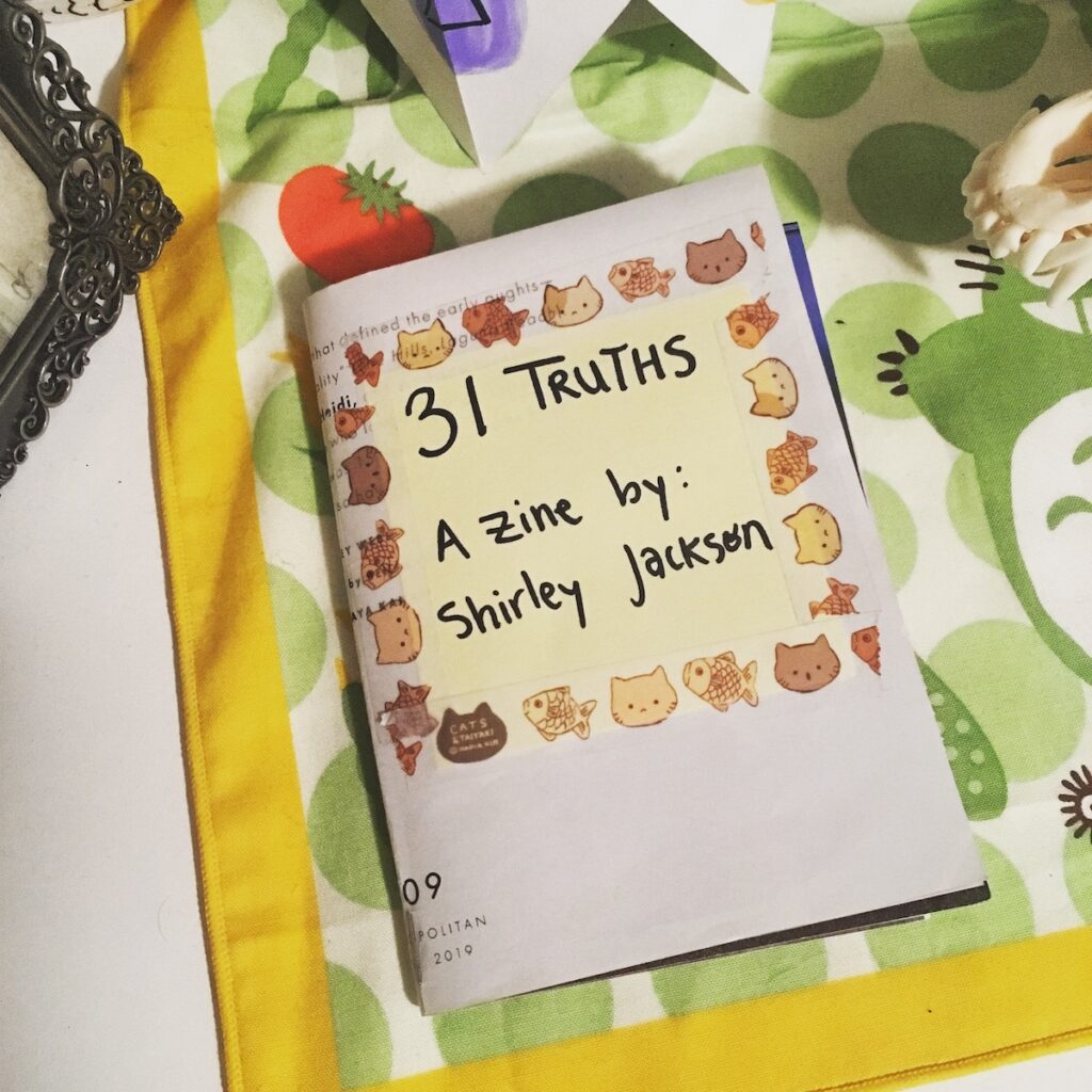 A zine I made titled "31 Truths". It was put together using pages from a magazine and sticky notes. For a whole month, I wrote on a sticky note every day a "truth" about myself to help me build up self-love and self-confidence.