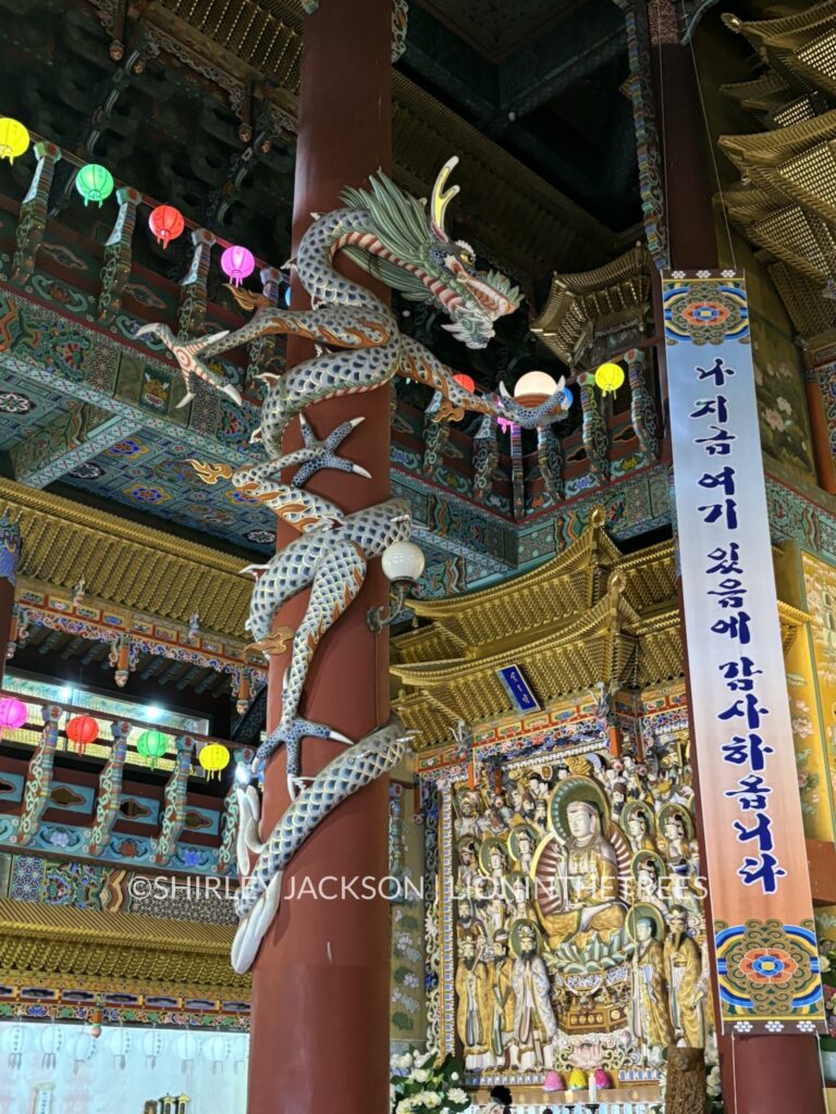 Photo of one of the giant dragons wrapped around one of the main entrance pillars