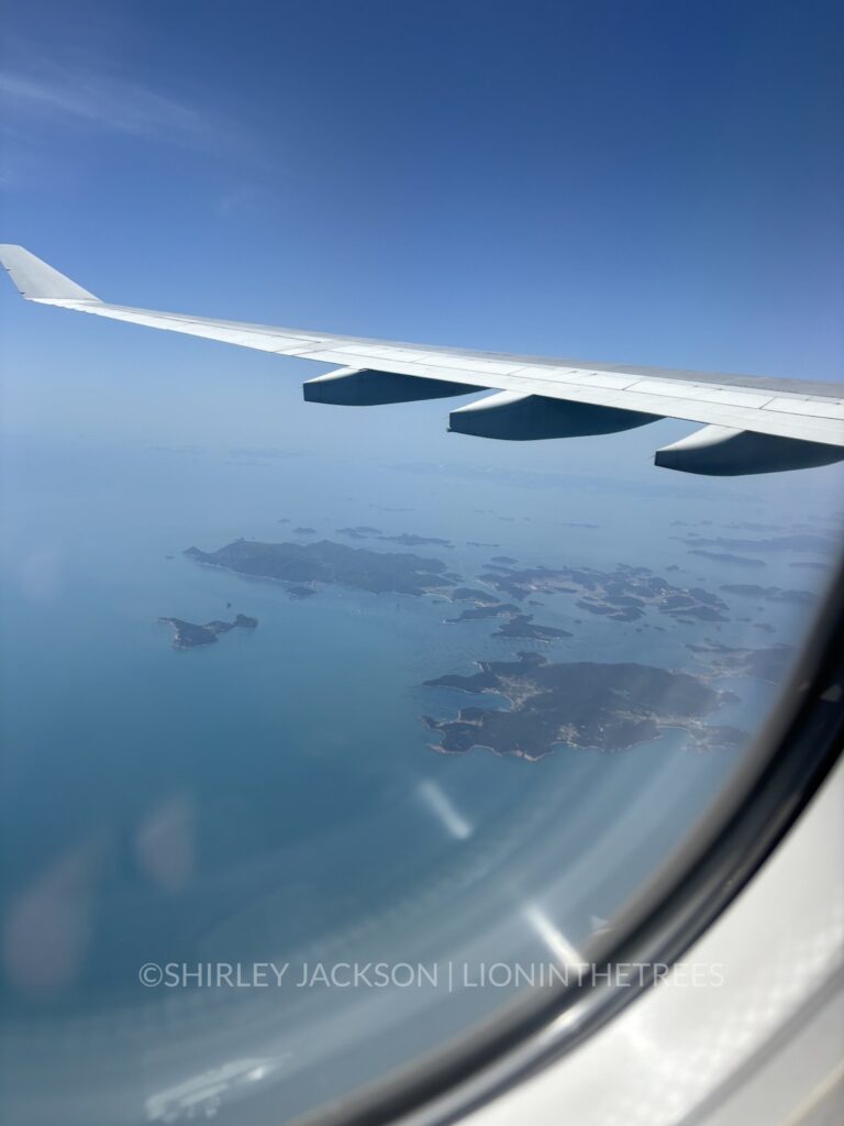 Window seat photo of our departure from Jeju Island