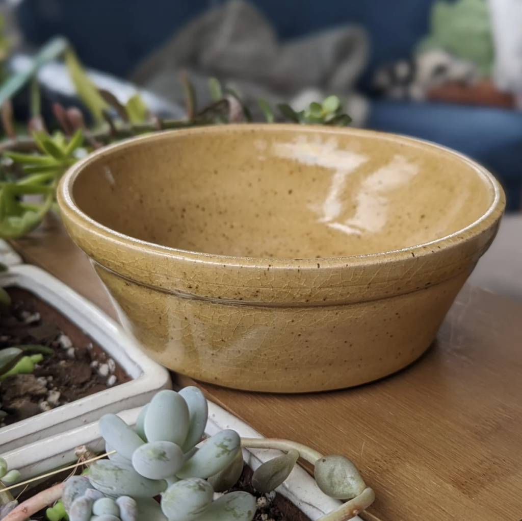 A caramel coloured ramen bowl. Made by chicagoqueercreations