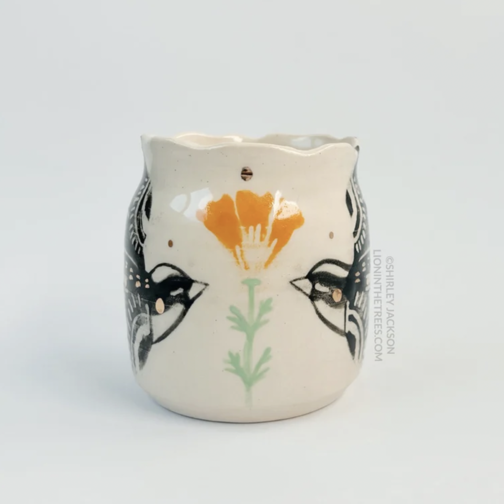 Ceramic vessel featuring my double Barn Swallow motif with a California Poppy motif in the center of the two birds. Features gold overglaze details.