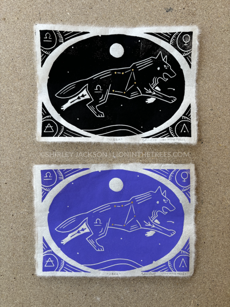 Two linoblock relief prints featuring the sign of Libra symbolised as a wolf. One print was done with black ink and the other is done in purple that represents the element of air.