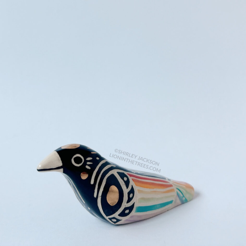 left side of the rainbow crow totem