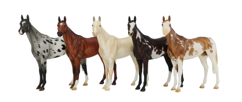 The full lineup of the 5 horses for this year's Surprise model. They were done on the Winx mold. The following colours done in matte are: Blue Varnish Semi-Leopard Appaloosa, Wild Bay with Gulastra Plume, Cremello, Dark Bay Overo, and a Chestnut Sabino.