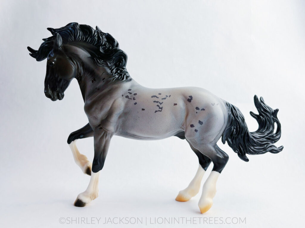 Show side view of Blue Zeus. He is blue roan with a unique white marking on the right side of his neck. He was done on the Fireheart mold.