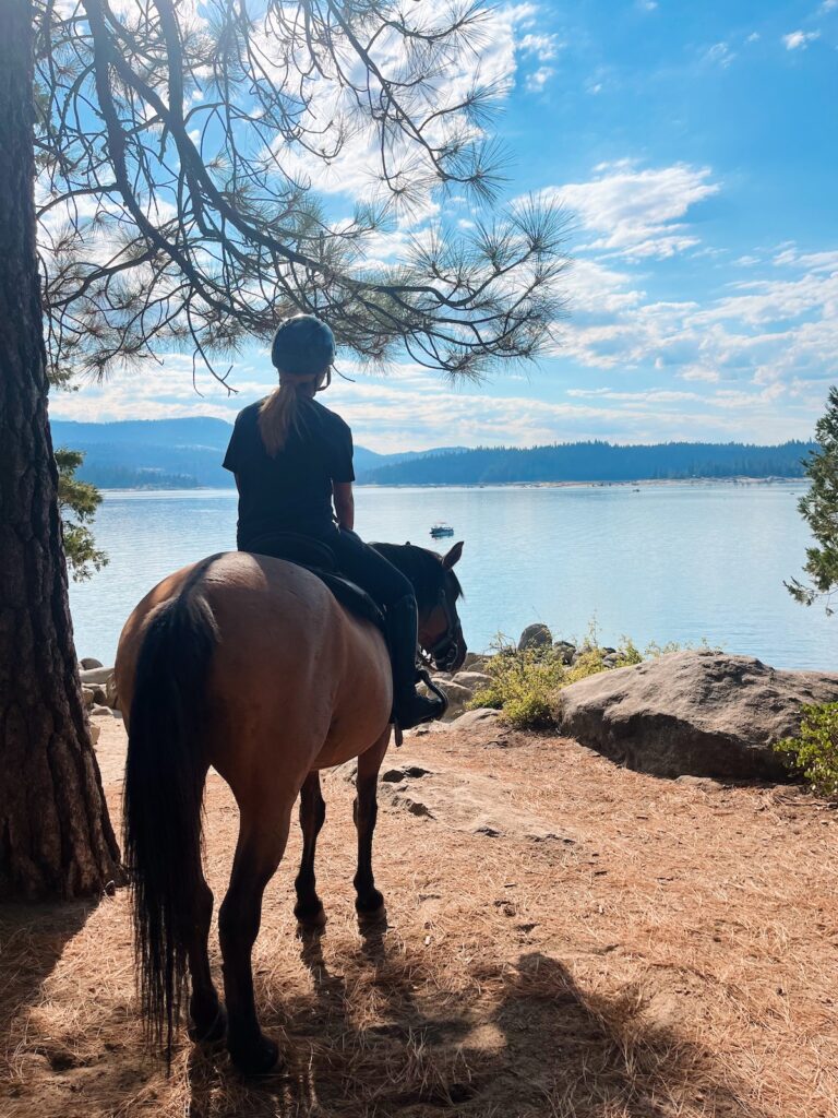 Photo of Dusty and I facing the lake.