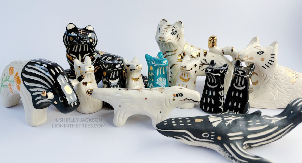 The group photo for my August/September pottery launch! This features the bison, black tiger, white tiger, white wolf, white gator, whale, and the smaller wolf totems.