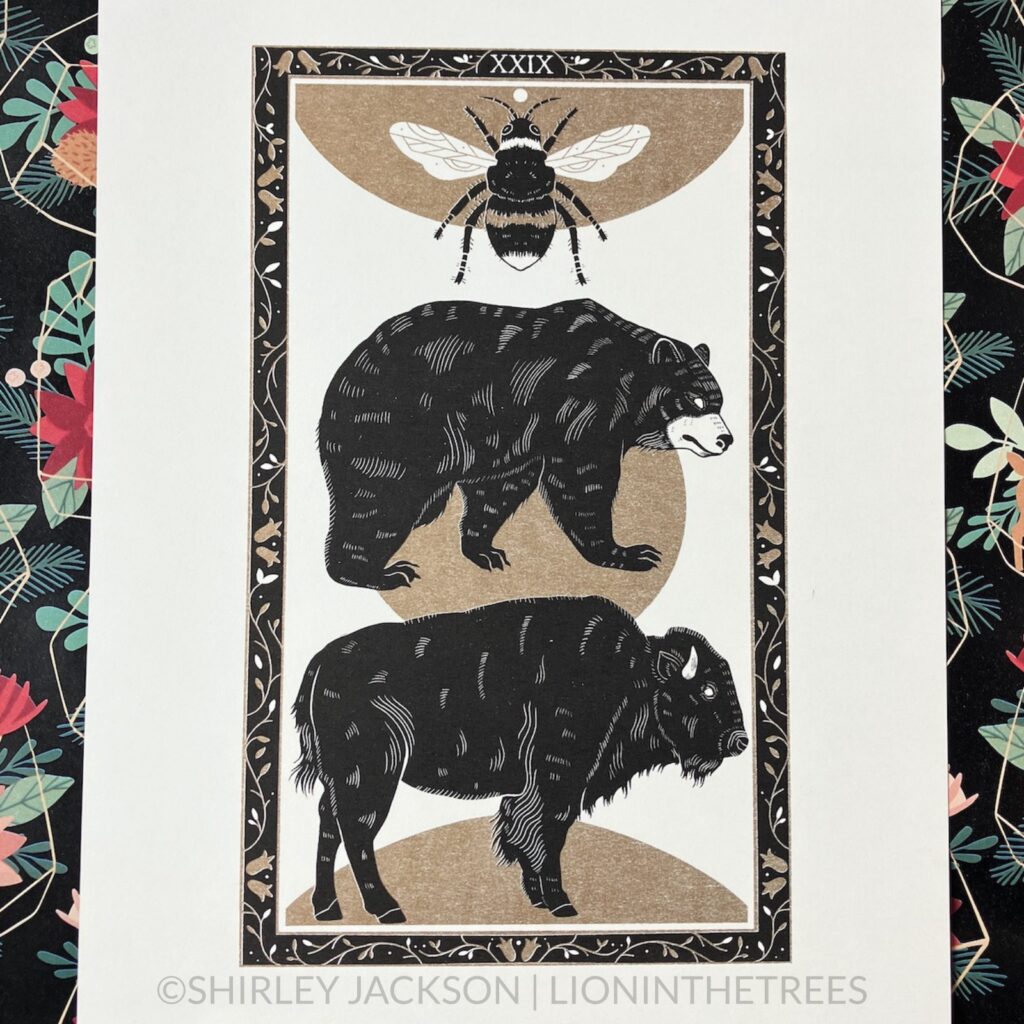 Risograph print featuring The Home tarot card from the Wild West Heart book. This image portrays a bee, a bear, and a bison stacked on top of one another within a floral frame.