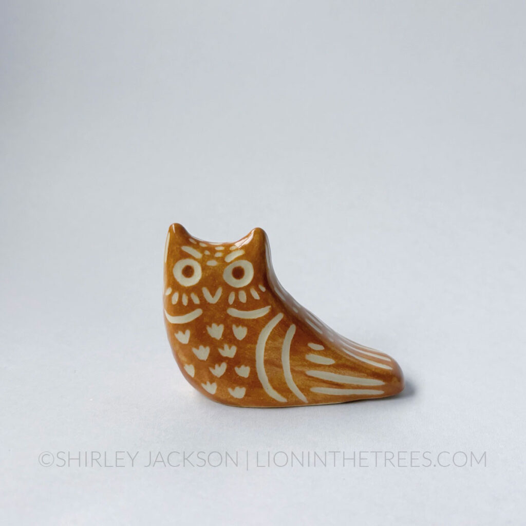 Brown underglaze sgraffito Great Horned Owl totem.