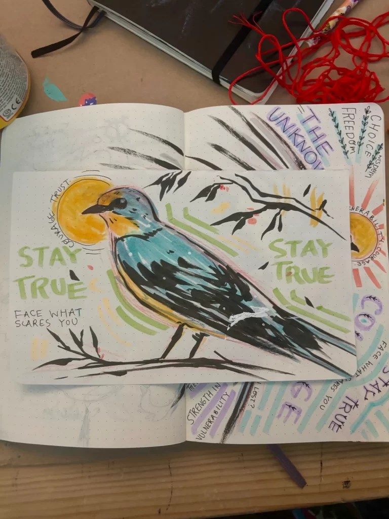 Marker and ink sketch of a Barn Swallow with the phrases "Stay True" and "Face what scares you" on the page.