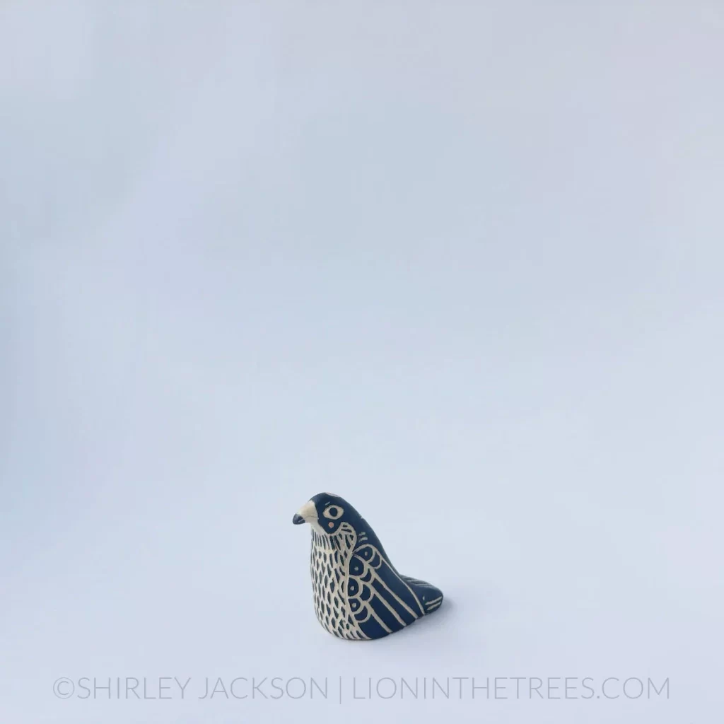 Small ceramic juvie peregrine falcon