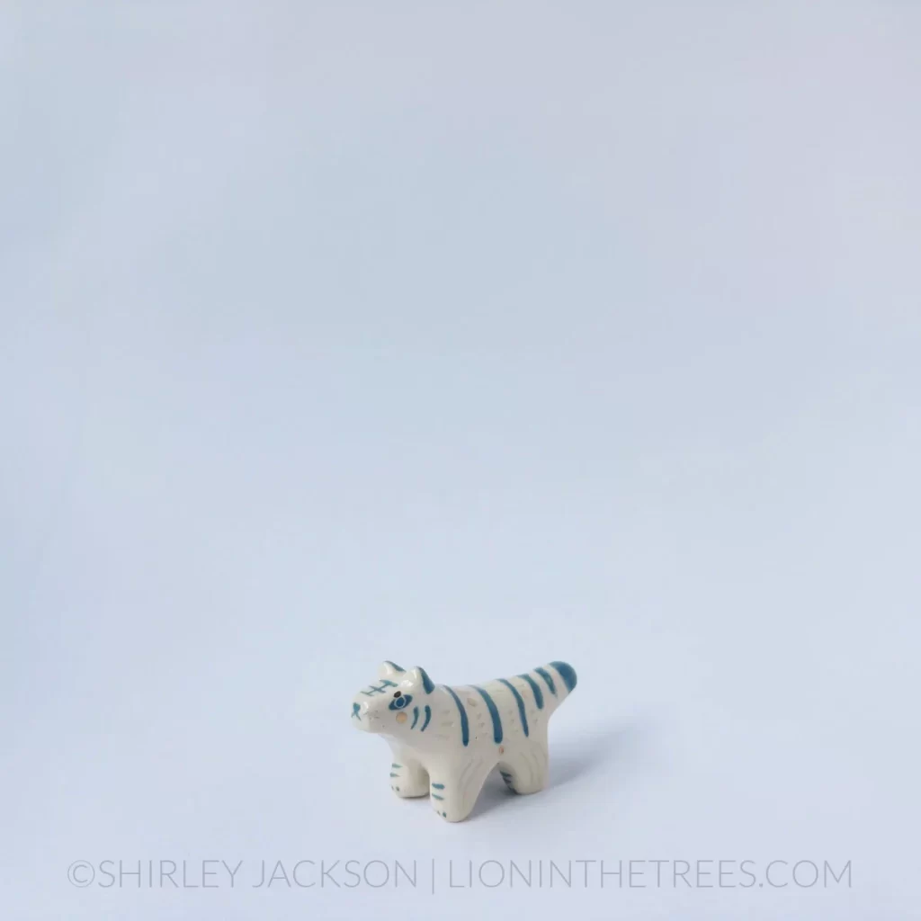 Small ceramic white and grey-blue tiger