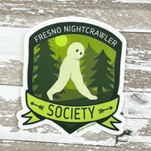 A sticker that says "Fresno Nightcrawler Society" and features a large nightcrawler walking through the woods